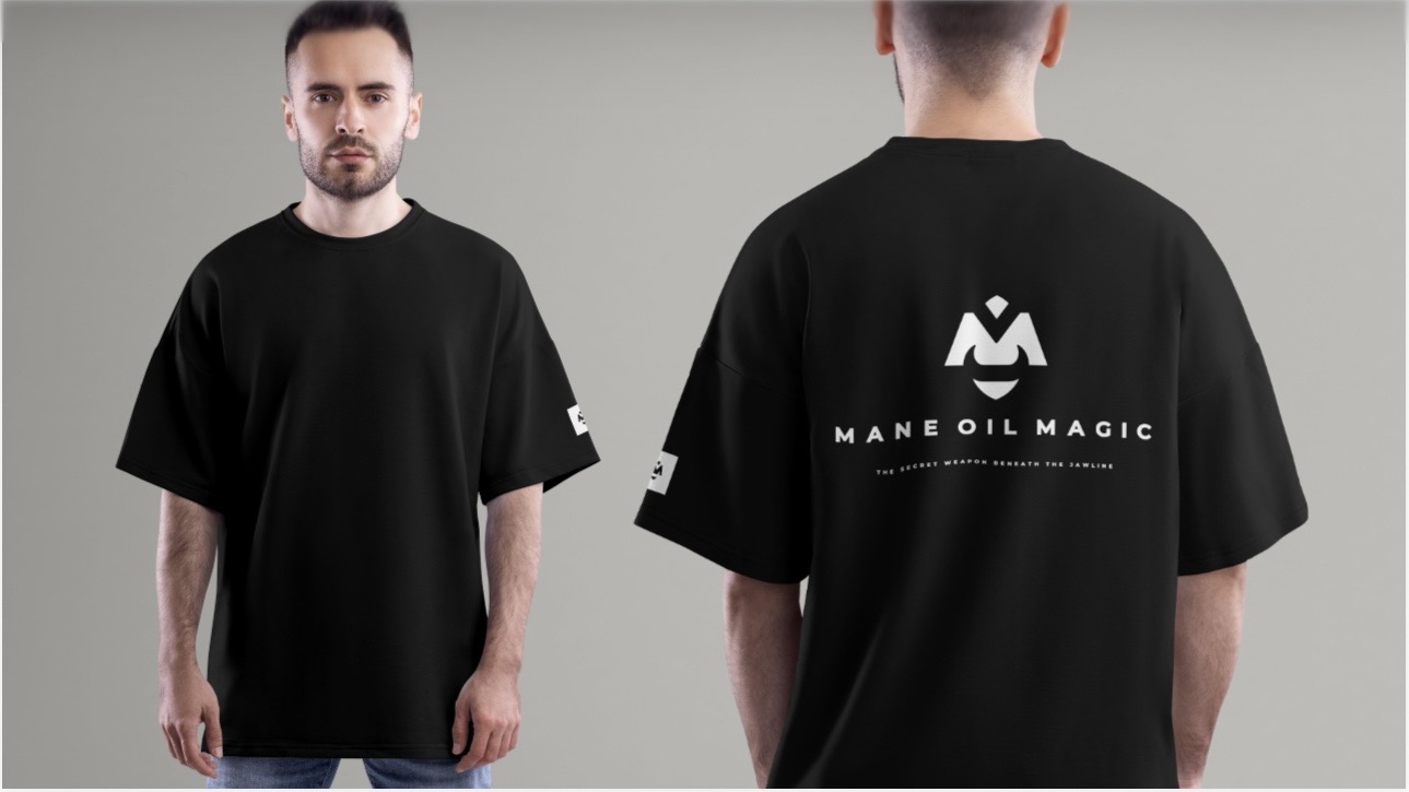 Front and back views of the black Mane Oil Magic oversized tee